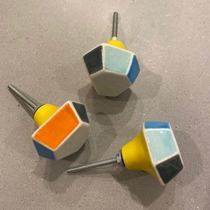 Three Anthropologie ceramic knobs